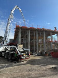 Concrete pump truck in use